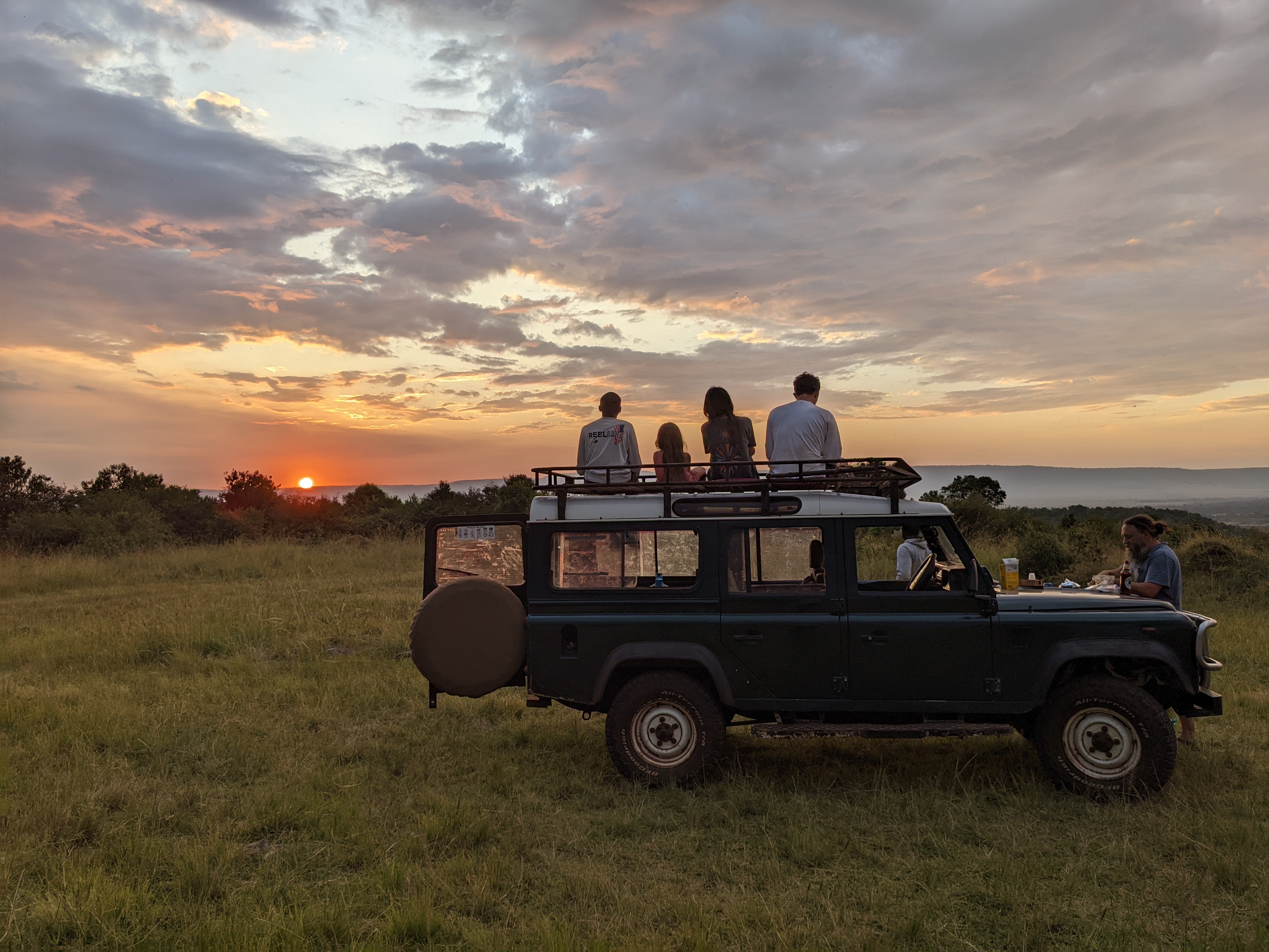 team of researchers and the sunset